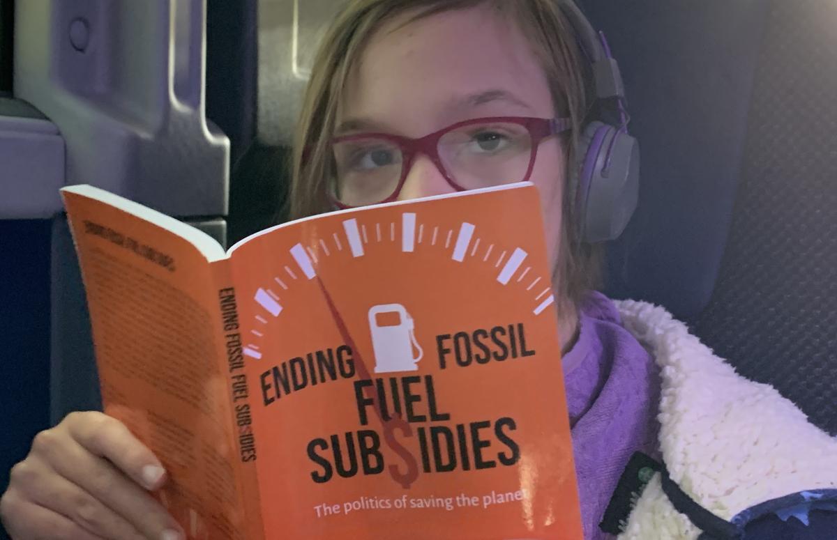 Natalie reading Neil's book 2023