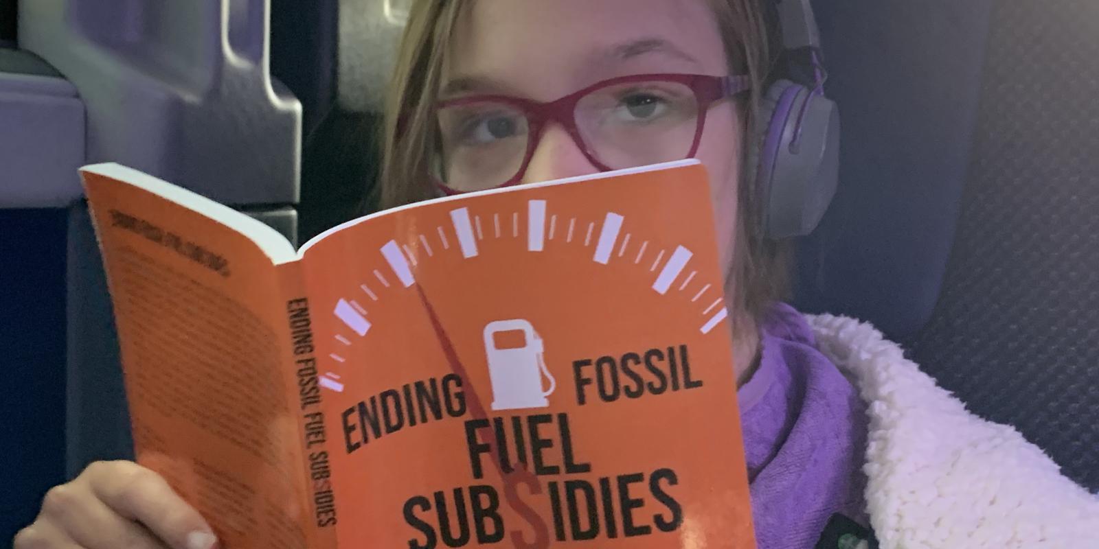 Natalie reading Neil's book 2023